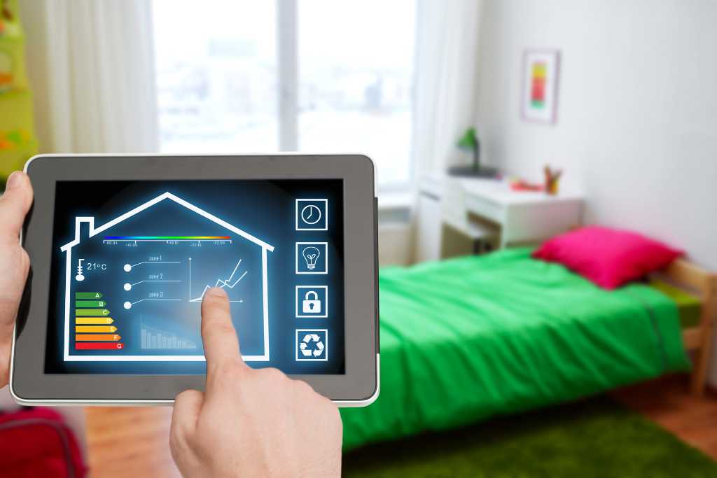 Smart home app on a tablet controlling area heating and cooling in a bedroom