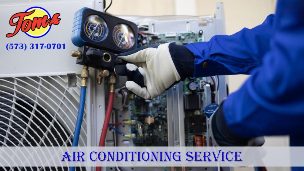 Air conditioner service technician hand checking AC refrigerant and maintenance check up